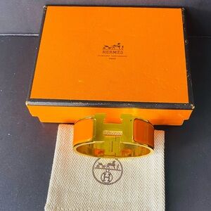 HERMES Signature Orange Enamel and Gold Plated Clic-Clac H GM Wide Bracelet